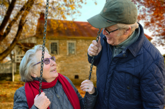 Older adults outside in autumn